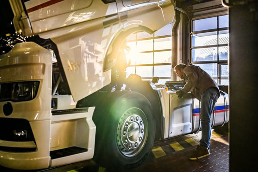 Man working on Diesel truck in South Chillicothe, TX